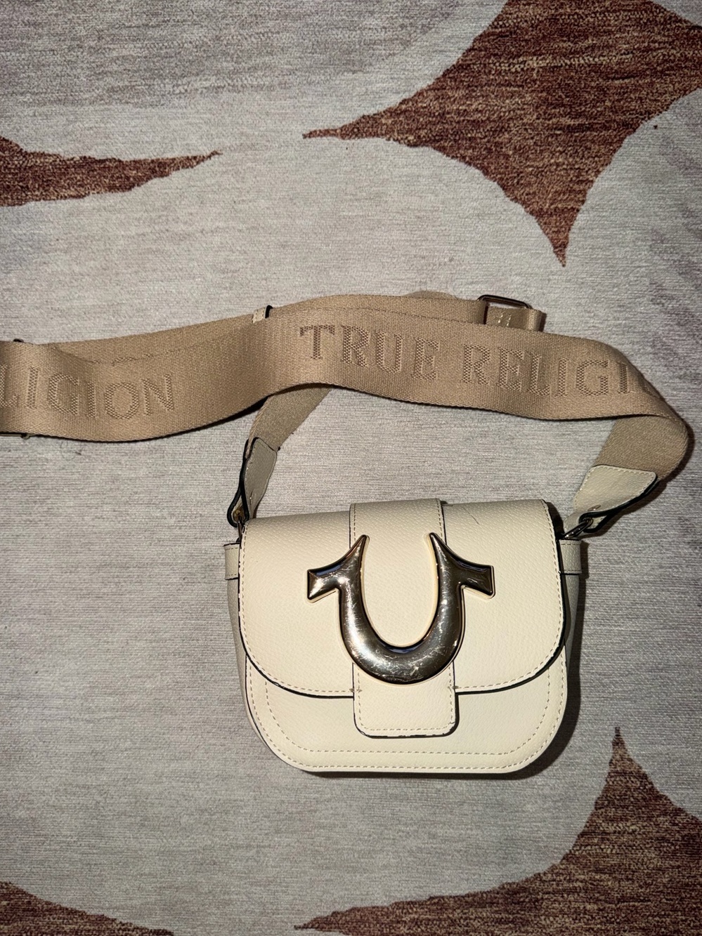 True Religion Cream Leather Crossbody with Embossed Strap and Horseshoe Accent